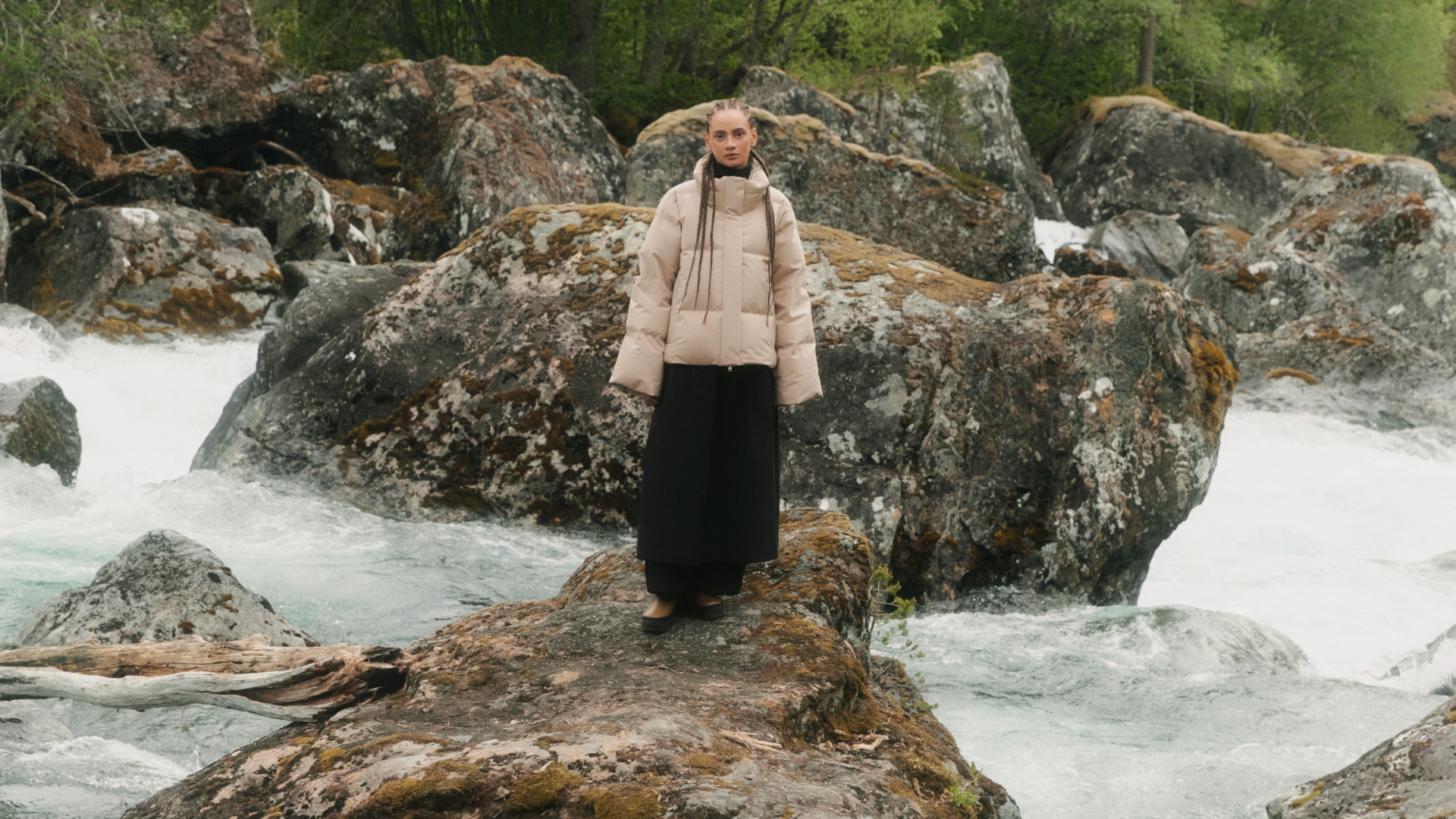 Woman wearing the Sæbø down jacket, now on sale