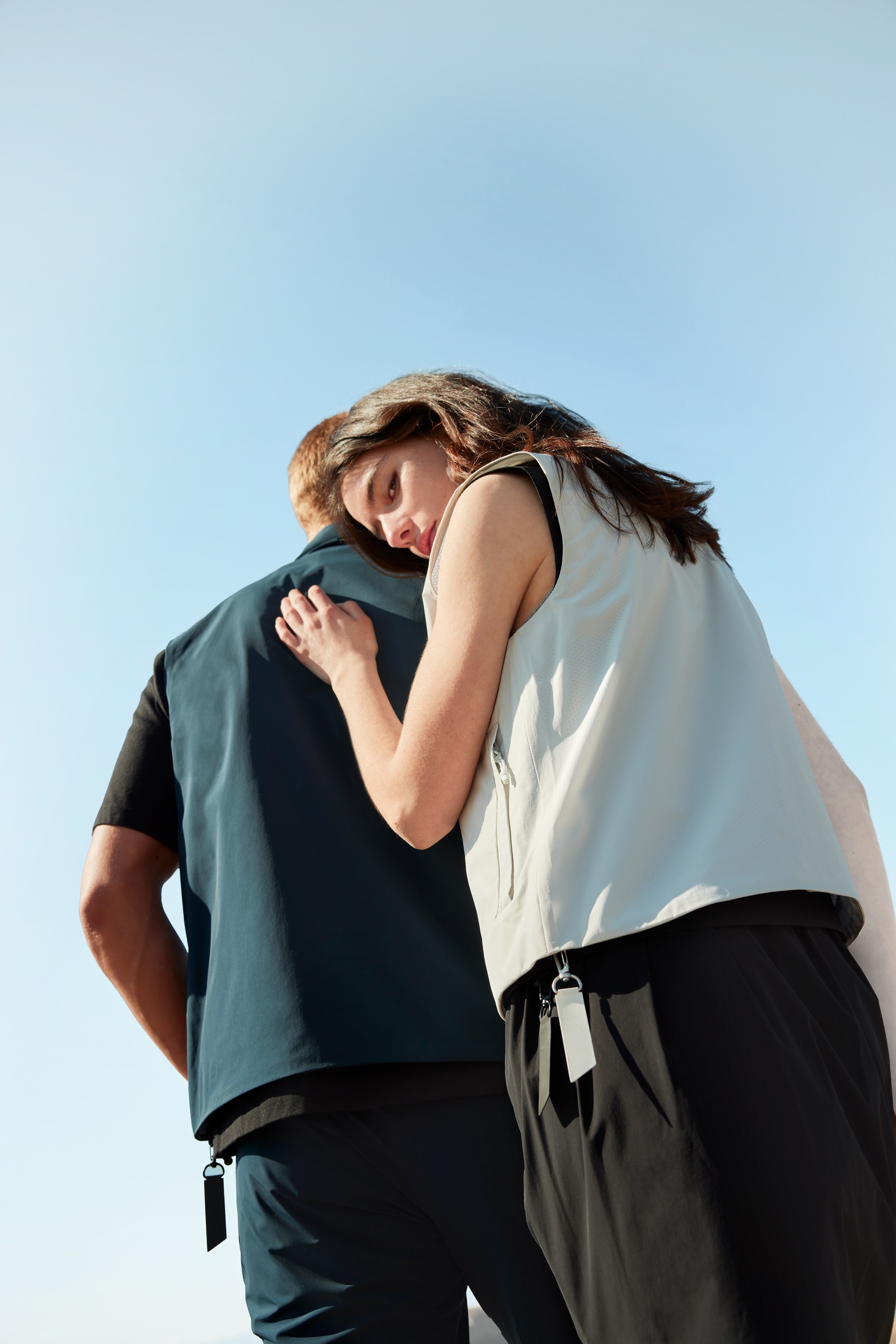 Woman and man wearing lightweight styles from BLÆST, created using the Sorona Agile fabric