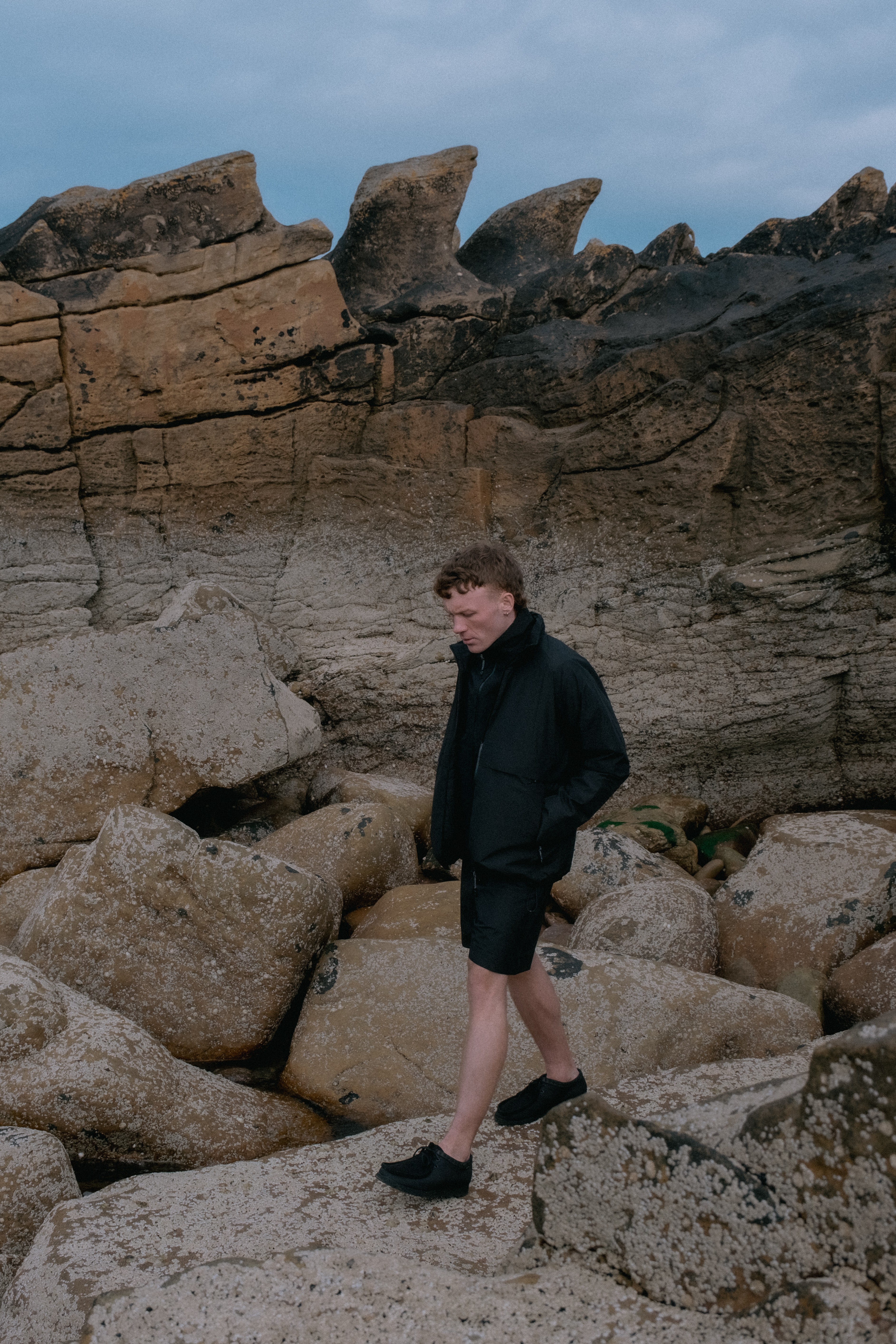 Man wearing the Flø jacket, Linge jacket, and Giske shorts from BLÆST